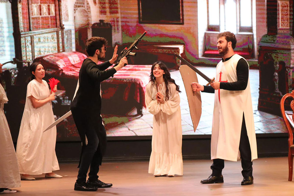 Auks department of music and drama presents the ridiculous adventures of king arthur