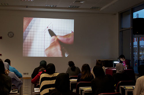 Auk arabic literature club organizes calligraphy workshop by jassim al-nasrallah
