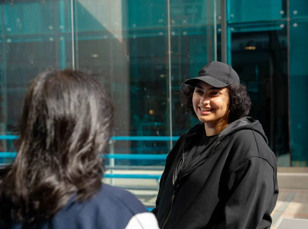 AUK students engaged in a discussion about tuition fees and financial planning