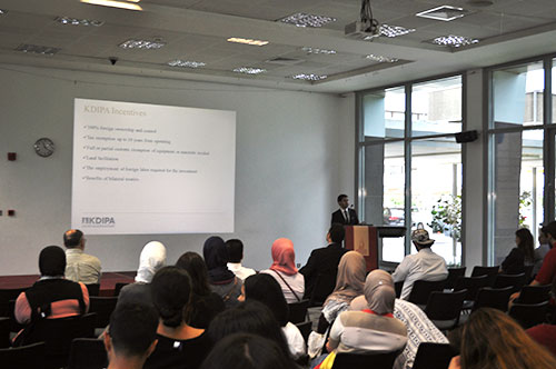Auk hosts a talk about kuwait law 116 of 2013