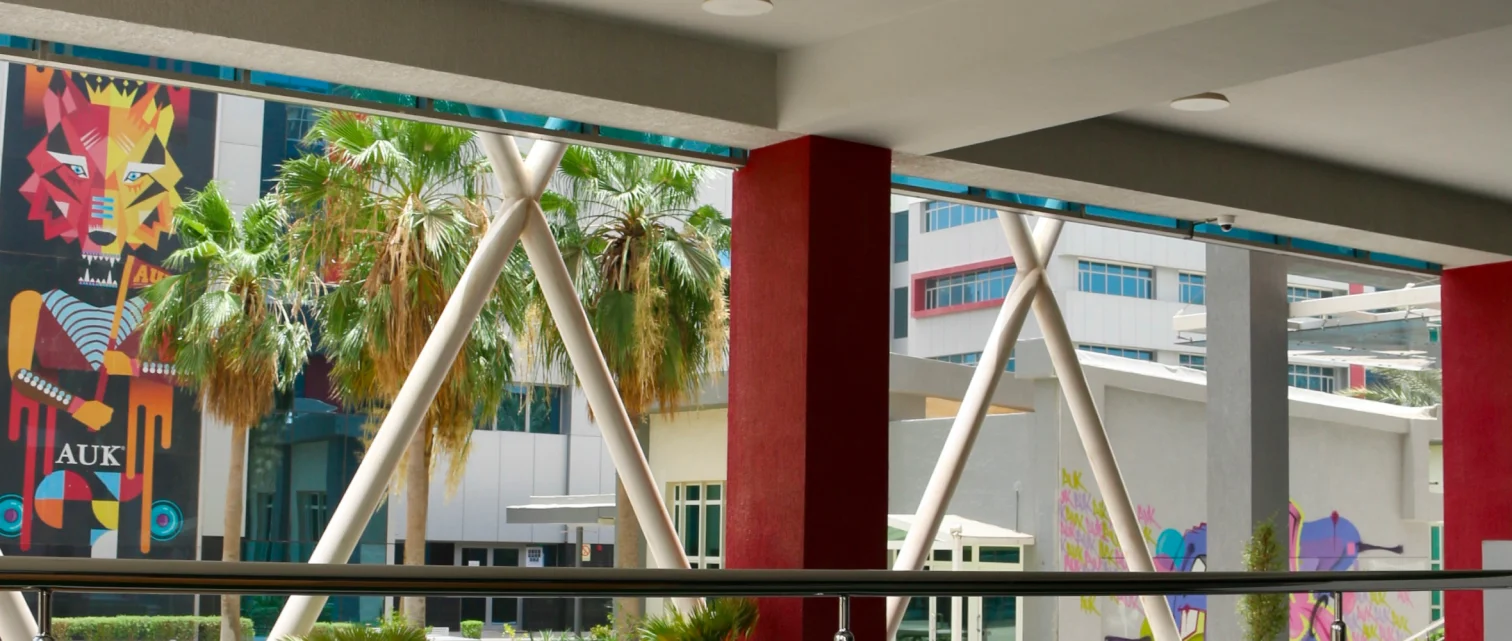 A spacious corridor on the AUK campus, featuring sleek modern architecture and inviting hallways.