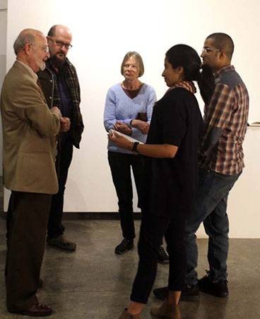 President tim sullivan and auk students visit masaha 13 harmony in the city exhibition