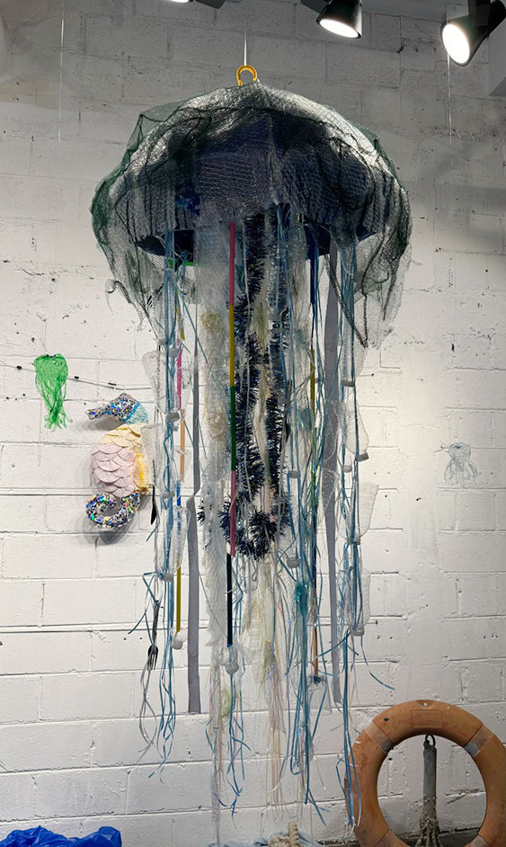 Championing sustainability through art auk students participate in waste to wonder exhibition