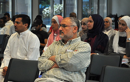 Auk hosts a talk about kuwait law 116 of 2013